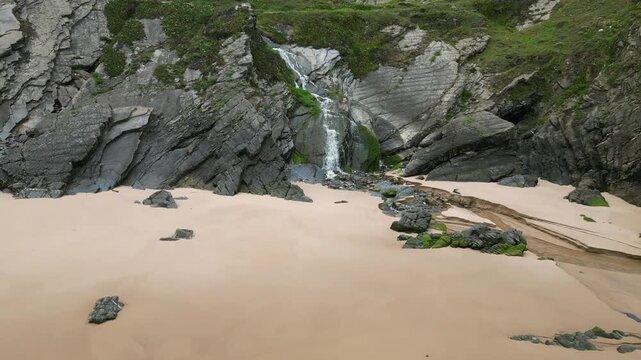 Aerial drone footage of Praia da Am&aacute;lia, Portugal: hidden beach, rugged cliffs and wild Atlantic coastline under natural light. Ideal for travel, nature and summer projects.