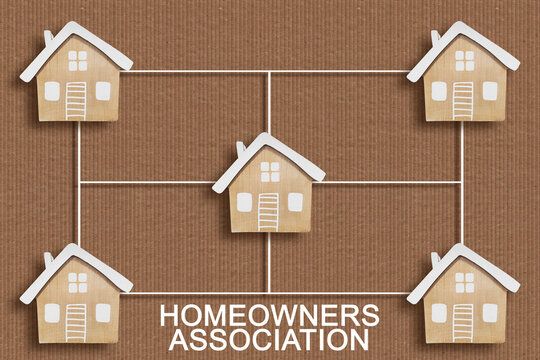 HOMEOWNERS ASSOCIATION CONCEPT WITH CONNECTED RESIDENTIAL HOUSE MODELS - Symbolic representation of community housing and real estate network for HOA and property management themes