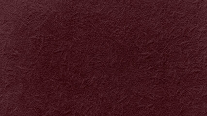 Fototapeta premium Textured dark red paper background with subtle creases and wrinkles.