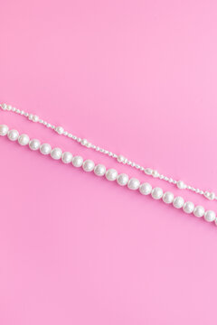Natural white pearls - beads for jewelry, top view. Precious and elegance concept background