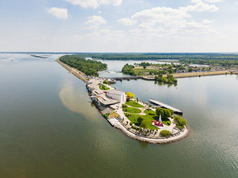 Aerial view of the Danubiana Meulensteen Art Museum on a peninsula in the Danube river with modern architecture and green parkland Bratislava, Bratislavsky kraj, Slovakia.