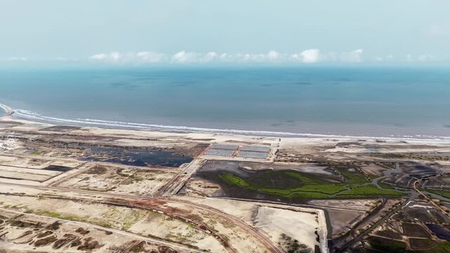 Wide aerial view of new port construction in progress