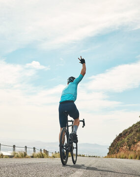 Fitness, cycling and greeting with man outdoor for workout, triathlon practice and journey. Wellness, bicycle training and transport with back of person on bike for exercise, health and athlete