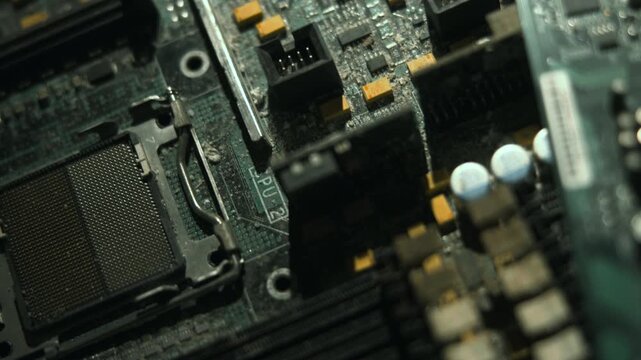 Extreme Macro Focus On CPU Socket Showing Delicate Pins And Solder Pads For Maintenance Inspection . Media
