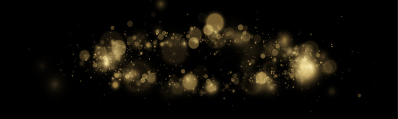 Tiny golden particles drift slowly, catching light and shimmering beautifully, perfect for overlay effects on backgrounds and festive illustrations. © goldstock