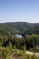 Obraz premium Serene Mountain Lake: Mirror of the Wilderness