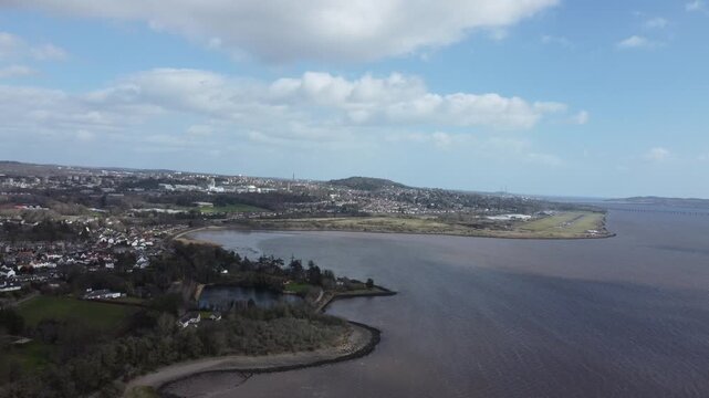 aerial drone sky shot of distant dundee law hill landscape view panoramic city over tay river bank and surrounding area