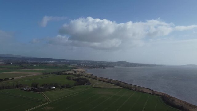 aerial drone sky shot of distant dundee law hill landscape view panoramic city over tay river bank and surrounding area