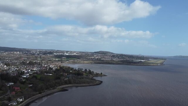 aerial drone sky shot of distant dundee law hill landscape view panoramic city over tay river bank and surrounding area