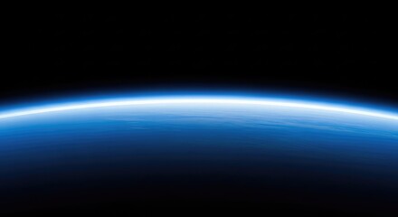 Fototapeta premium A breathtaking view of the curved planetary horizon showing a vibrant blue atmospheric glow transitioning into the deep black void of space, glow, blue, sunrise