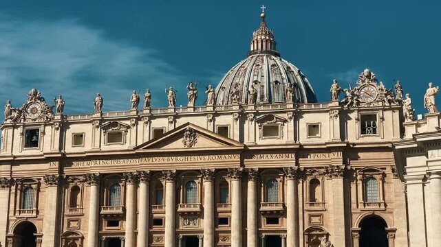 Panning shot of st peter's basilica facade and dome in vatican city showing rooftop statues and colonnade Italy Rome.
