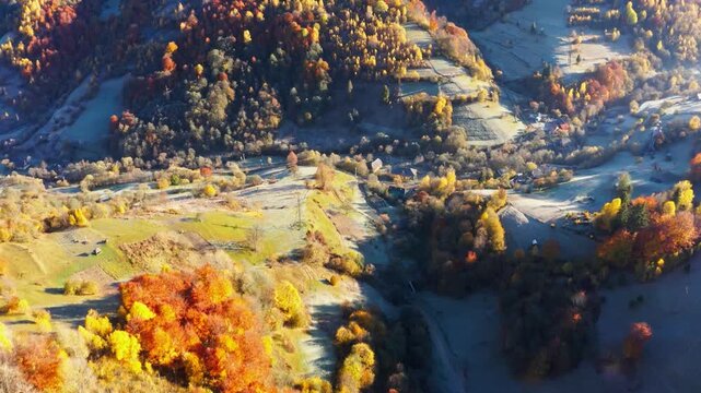 Mountain ridge with terracotta forests under cloudy sky
