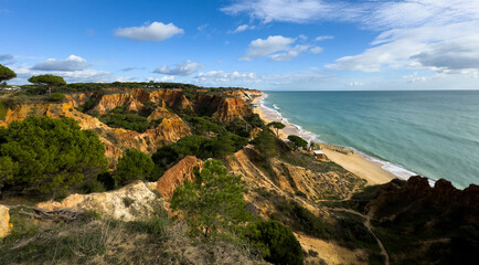 Naklejka premium Barranco Beach, Algarve, amazing desert beach between cliffs in southern Portugal with incredible blue water