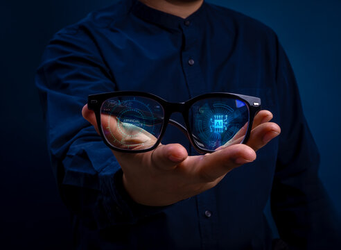 AI smart glasses concept with futuristic interface reflected in lenses. Artificial intelligence vision, augmented reality technology, data visualization and digital innovation in modern wearable tech.