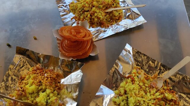 Traditional Indore Breakfast Spread featuring Poha, Sev, and Jalebi