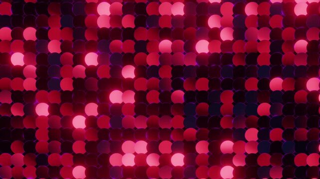 Reflective pink and purple sequins shimmering and moving in a looping pattern