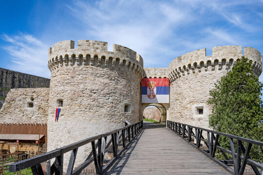 The iconic landmark Zindan Gate with the Serbian flag, part of the Belgrade Fortress and Kalemegdan Park Complex overlooking the Sava River and River Danube, Belgrade, Serbia.