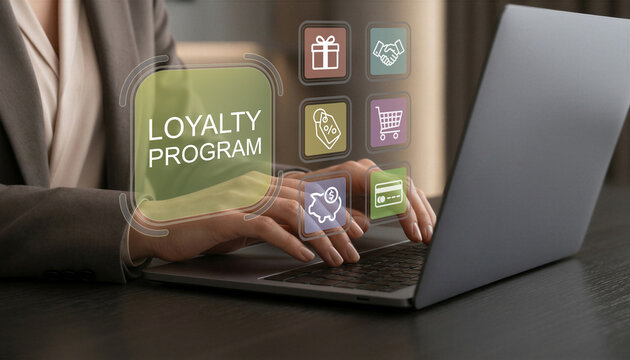 Customer loyalty and loyalty program concept. Analysis of customer retention, discount strategy and membership benefits. Businesswoman using laptop for loyalty program management
