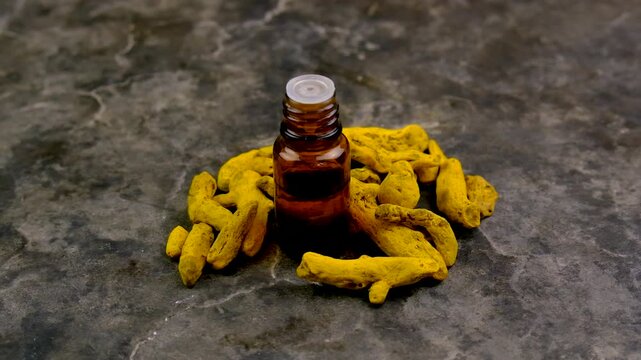 Turmeric root for supplements and essential oils. Selective focus.