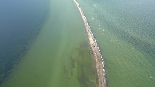 Cinematic drone shot of the Rewa Mew in the middle of the Polish Baltic Sea.