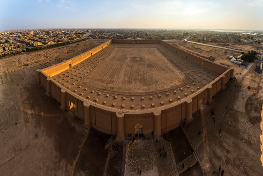 Aerial view of the Great Mosque of Samarra featuring its massive outer walls and bastions overlooking the urban landscape Samarra, Saladin Governorate, Iraq.