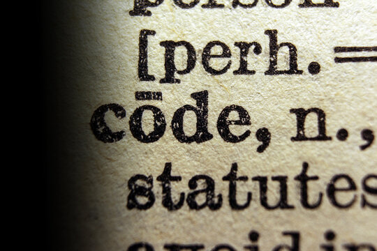 Word code on dictionary page, macro close up