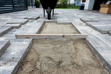 Paving work in progress, laying concrete slabs © Michal