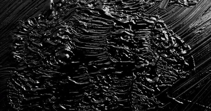 Black Paint smear and mix. Stop-Motion animation. Hand painted black ink light box element.