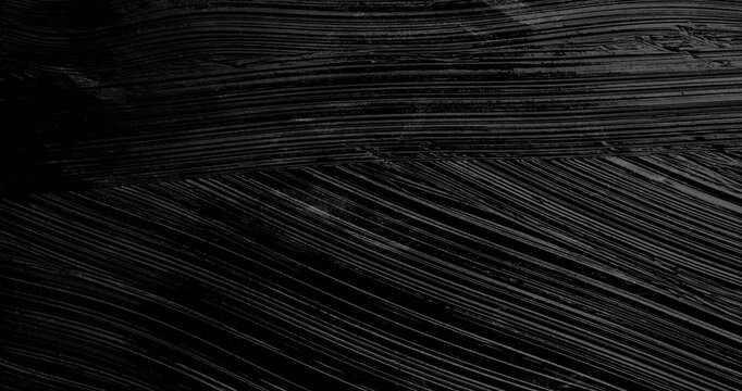 Black Paint smear and mix. Stop-Motion animation. Hand painted black ink light box element.