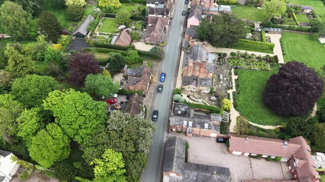 The stunning St Oswald&rsquo;s Church and surrounding Malpas - drone gimbal down, rise up and reveal, Cheshire, UK