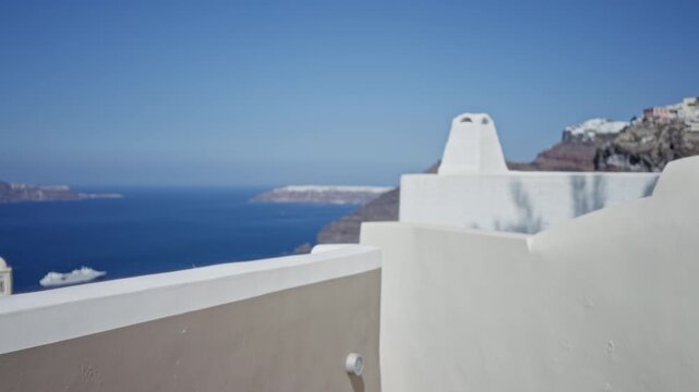 Santorini rooftop terrace with white stucco walls and distant caldera sea view defocused outdoor; background backplate copyspace calm.