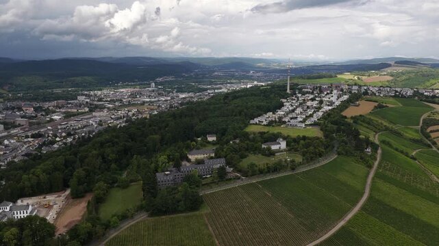 Aerial view flying over trier germany and petrisberg hill vineyards