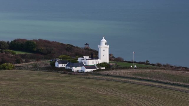 St margaret's lighthouse standing on the white cliffs of dover