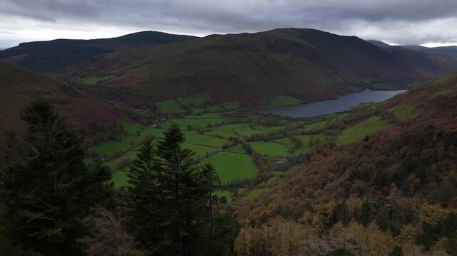Dramatic shadows moving across lake district valley