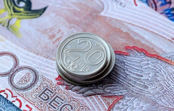 Kazakhstani tenge money bills and coins on table. Kazakhstan cash of KZT currency