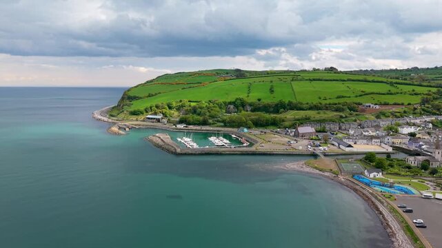 Travelling 4K 60FPS aerial video of Glenarm in County Antrim, Northern Ireland in the UK. Produced in 3840x2160 and with Rec709 color.