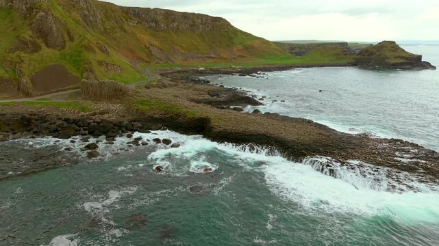 Ultra-wide reversing 60FPS 4K aerial of The Giant's Causeway in Bushmills, County Antrim in Northern Ireland. Produced with Rec709 color in 3840x2160.