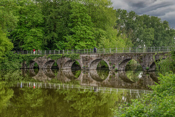 Fototapeta premium Brugge, Belgium - May 05, 2026: Bridge on the Lake Minnewater