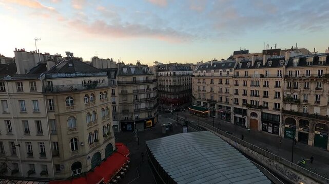 Paris City Skyline at Sunset with Haussmann Buildings and Colorful Sky