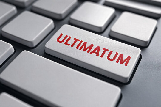 Close-up of a keyboard key labeled Ultimatum