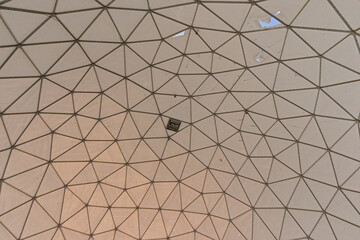 Obraz premium Inside view on the roof of a geodesic dome, with pattern of triangles. detail of the old radar station