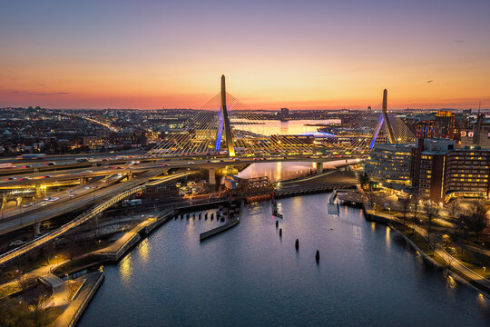 Zakim Bridge over Boston waterfront at sunrise twilight