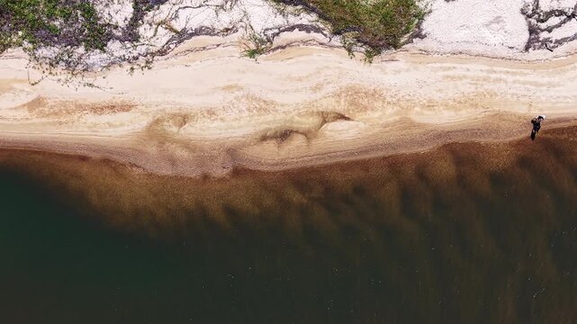 Top Down View of Rippling Water Near the Beach
