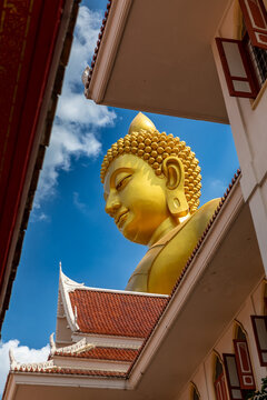 Bangkok, Thailand - March 15 2026 : The giant seated buddha statue at the Wat Paknam Phasi Charoen temple, Famous place in Bangkok.
