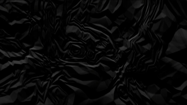 Abstract dark black texture with wavy folds and shiny highlights