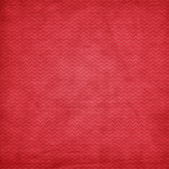 Fototapeta premium Vintage red textured chevron seamless pattern with subtle zigzag details. Grunge geometric background for wallpaper, textile and retro craft design.
