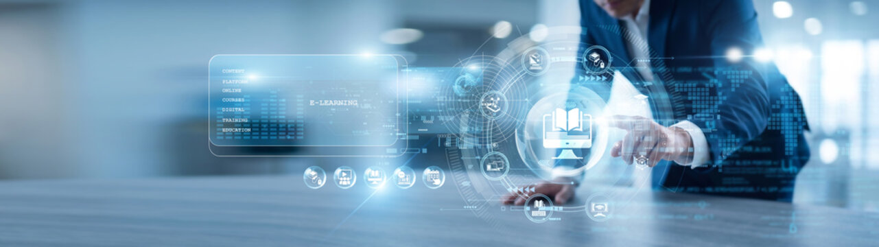 Instructor hand touch E-LEARNING module accessing student network and digital coursework. Interactive platforms facilitate remote training and skill acquisition for global workforce needs.