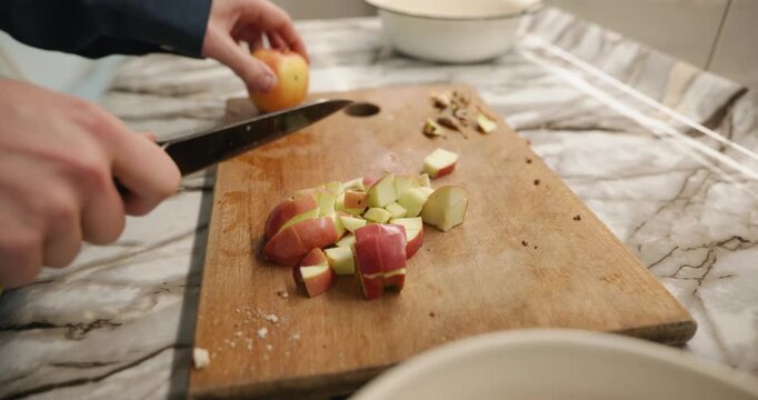 Caucasian man prepares desert at kitchen at home. 4K 10-bit