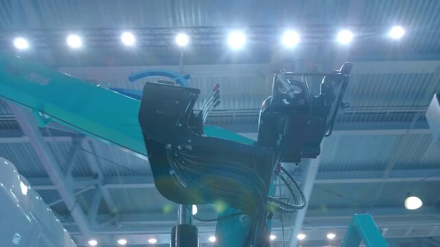 A seat and multiple levers for crane works, without a special cab on the new truck. Closeup. Shot in motion 