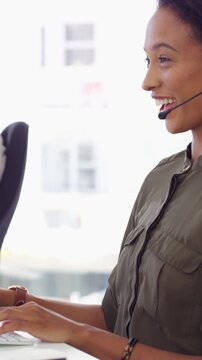 Telemarketing, woman or headset with computer in call center for cold calling, explain offer or chat. Typing, happy sales agent and talking on tech for product knowledge, upsell service and coworking